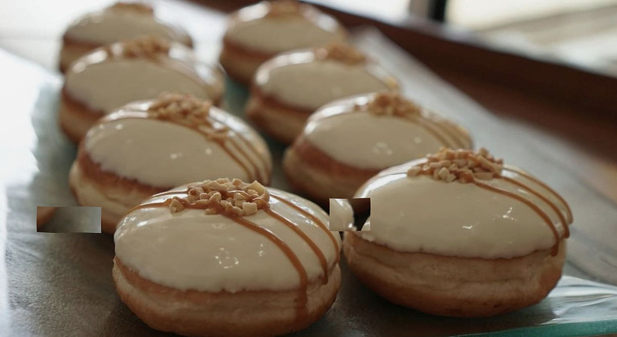 Birthday cake in deep teal with brushed gold leaf edges